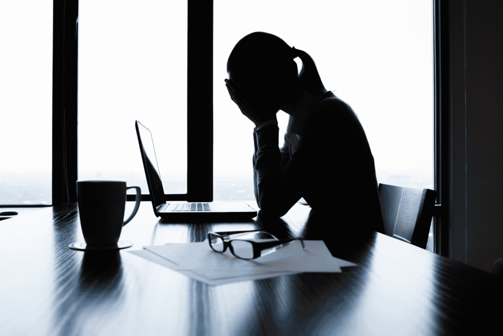 woman-facepalming-in-office